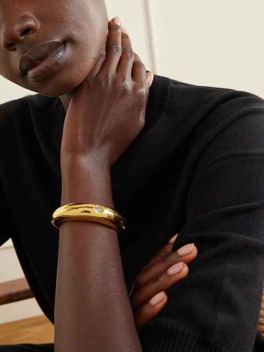 Image of Bracelets. Product name - Delfina Gold-plated Cubic Zirconia Bangle in Multi colour by brand - Simuero