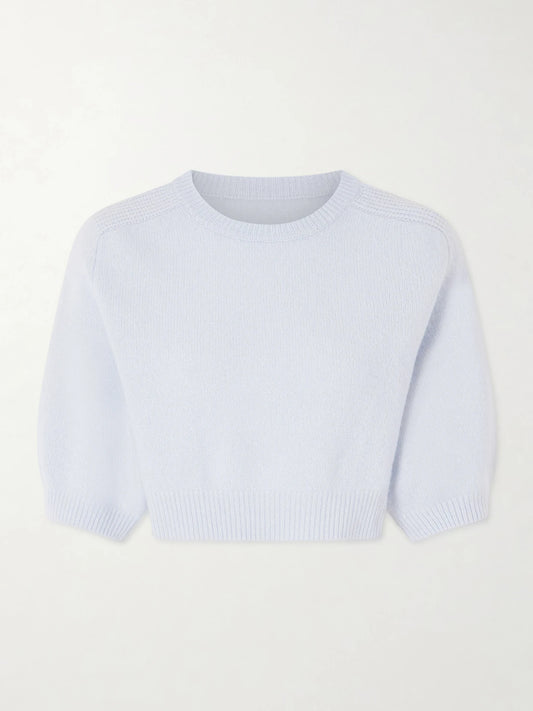 Image of a model wearing Outerwear. Product name - Lorelai Cropped Wool And Cashmere-blend Sweater in Light blue colour by brand - KHAITE