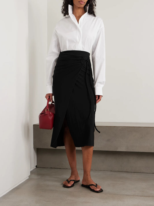 Image of a model wearing Skirts. Product name - Gathered Jersey Wrap-effect Maxi Skirt in Black colour by brand - Max Mara