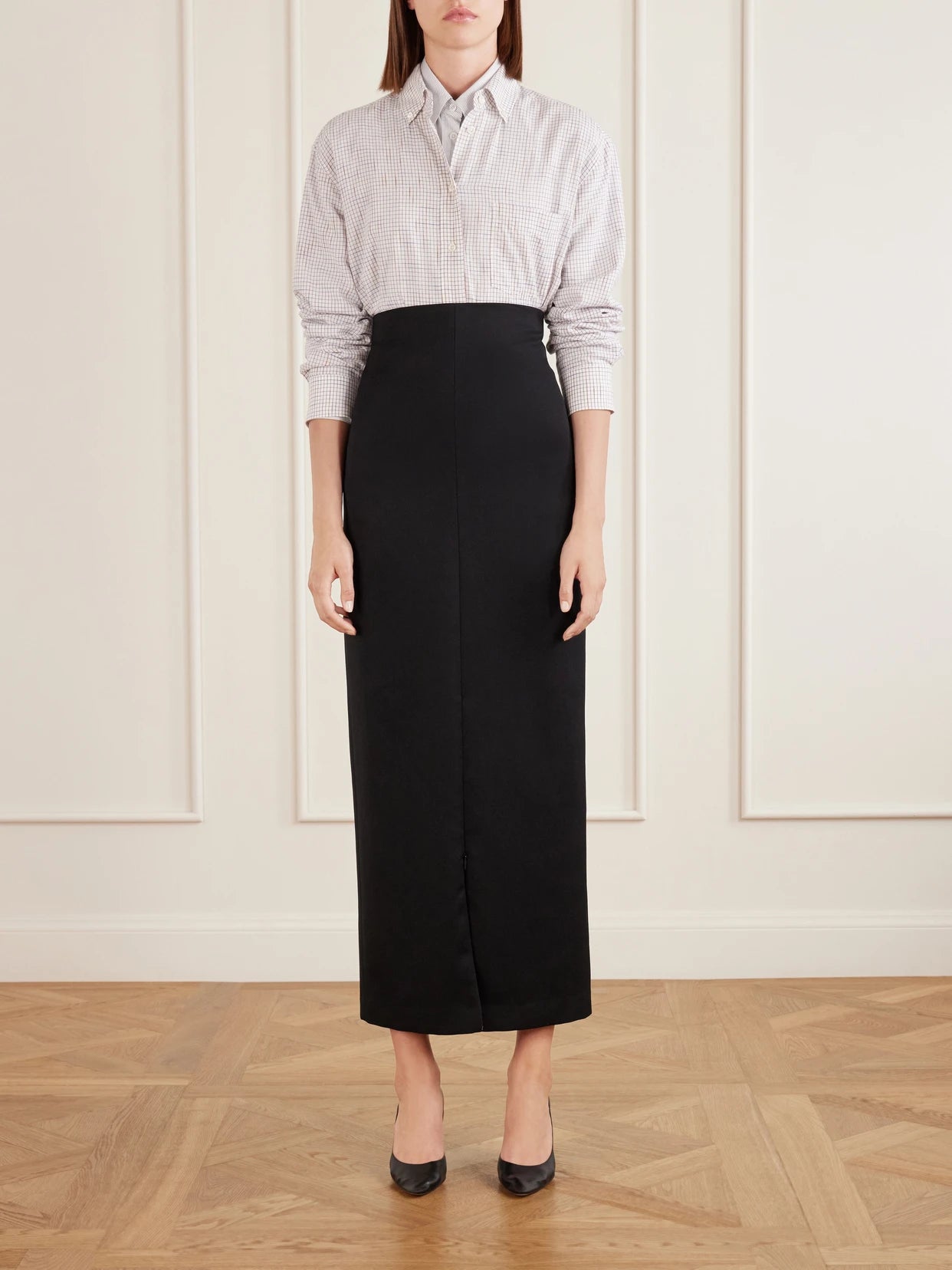 Image of a model wearing Tops. Product name - Dalan Checked Cotton Shirt in White colour by brand - The Row