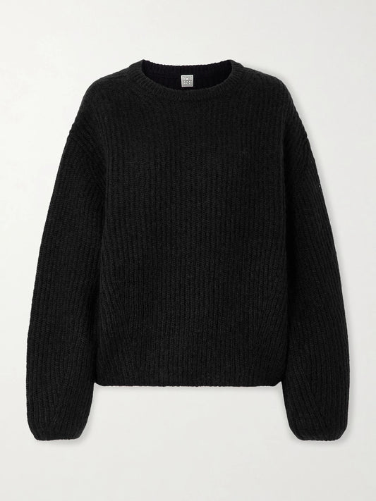 Image of a model wearing Outerwear. Product name - Ribbed Mohair-blend Sweater in Black colour by brand - TOTEME