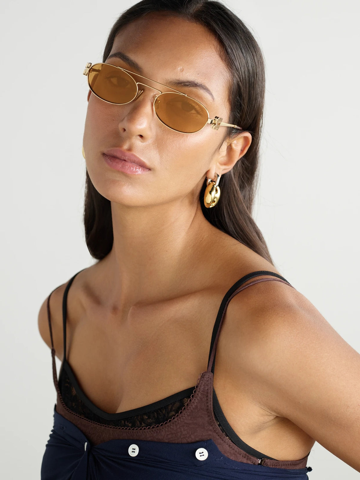 Image of Sunglasses. Product name - Oval-frame Gold-tone Sunglasses in Multi colour by brand - Miu Miu Eyewear