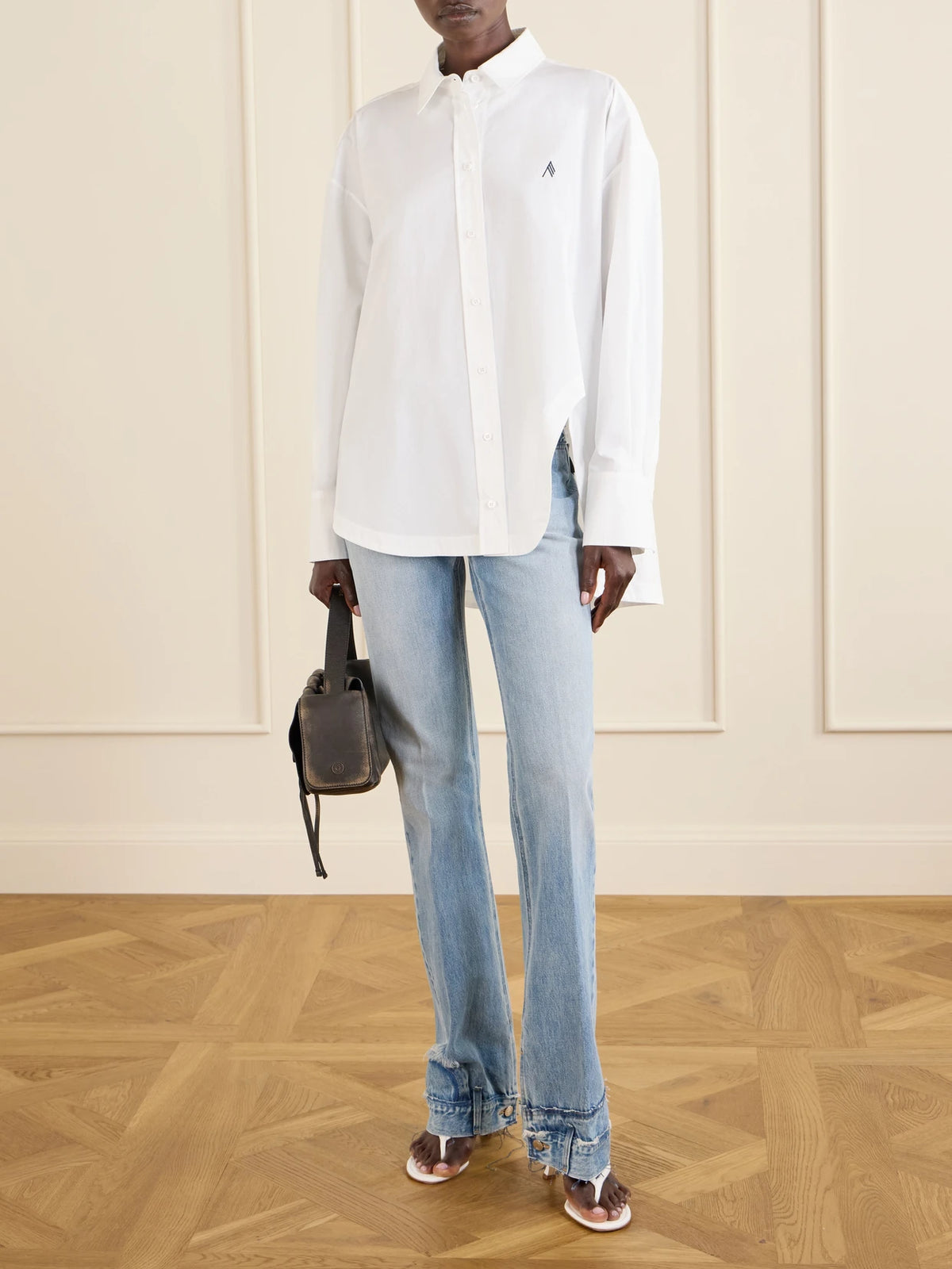 Image of a model wearing Tops. Product name - Cotton-poplin Shirt in White colour by brand - The Attico