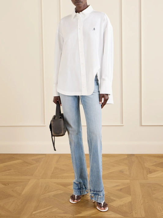 Image of a model wearing Tops. Product name - Cotton-poplin Shirt in White colour by brand - The Attico