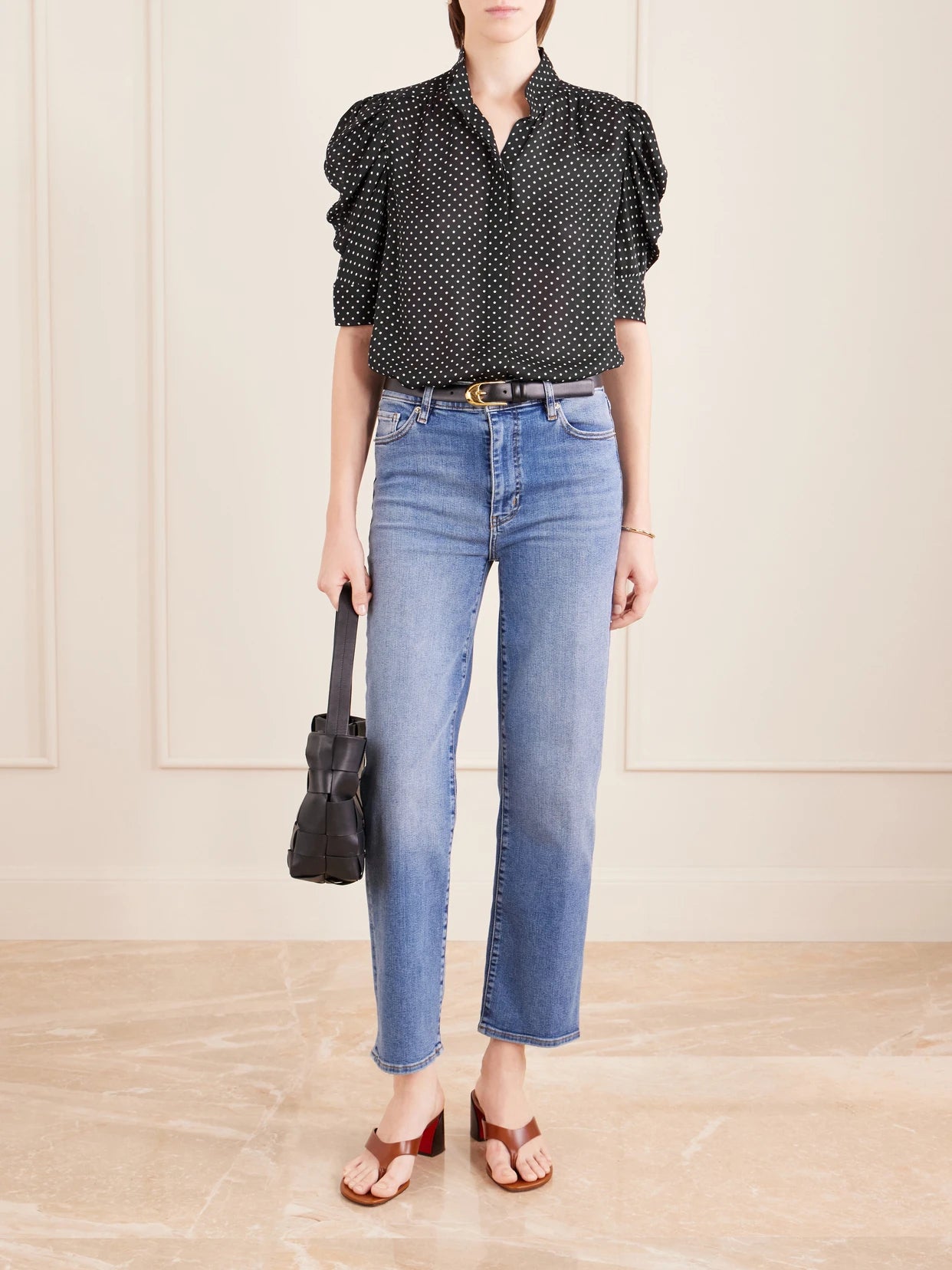 Image of a model wearing Tops. Product name - The Gillian Polka-dot Silk-voile Blouse in Black colour by brand - FRAME