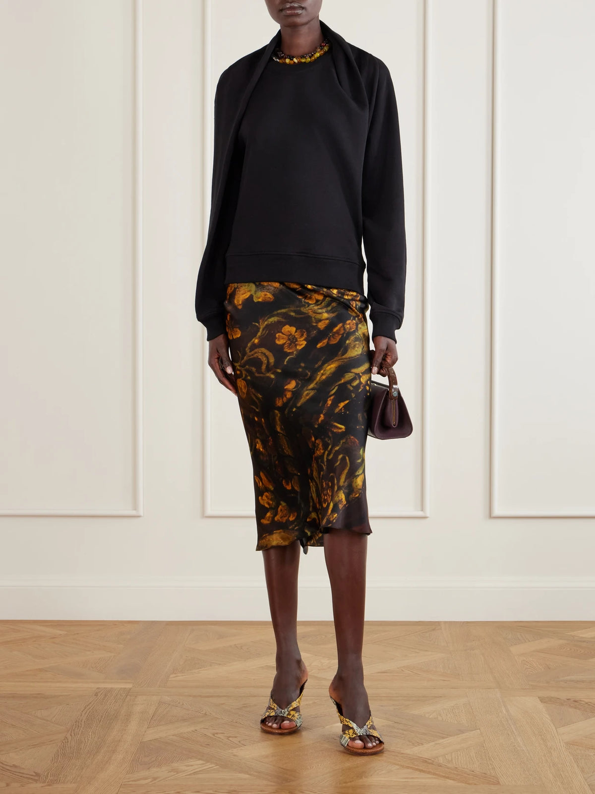 Image of a model wearing Tops. Product name - Draped Cotton-jersey Sweatshirt in Black colour by brand - Dries Van Noten