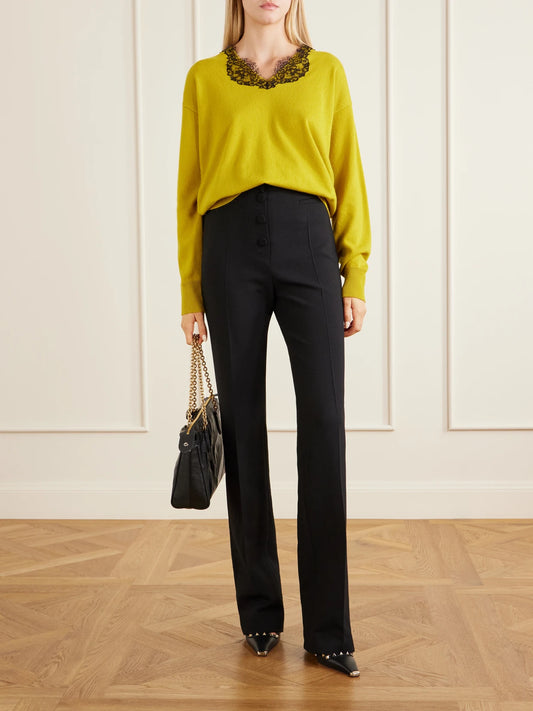 Image of a model wearing Pants. Product name - Straight-leg Wool Crepe Pants in Black colour by brand - Valentino Garavani