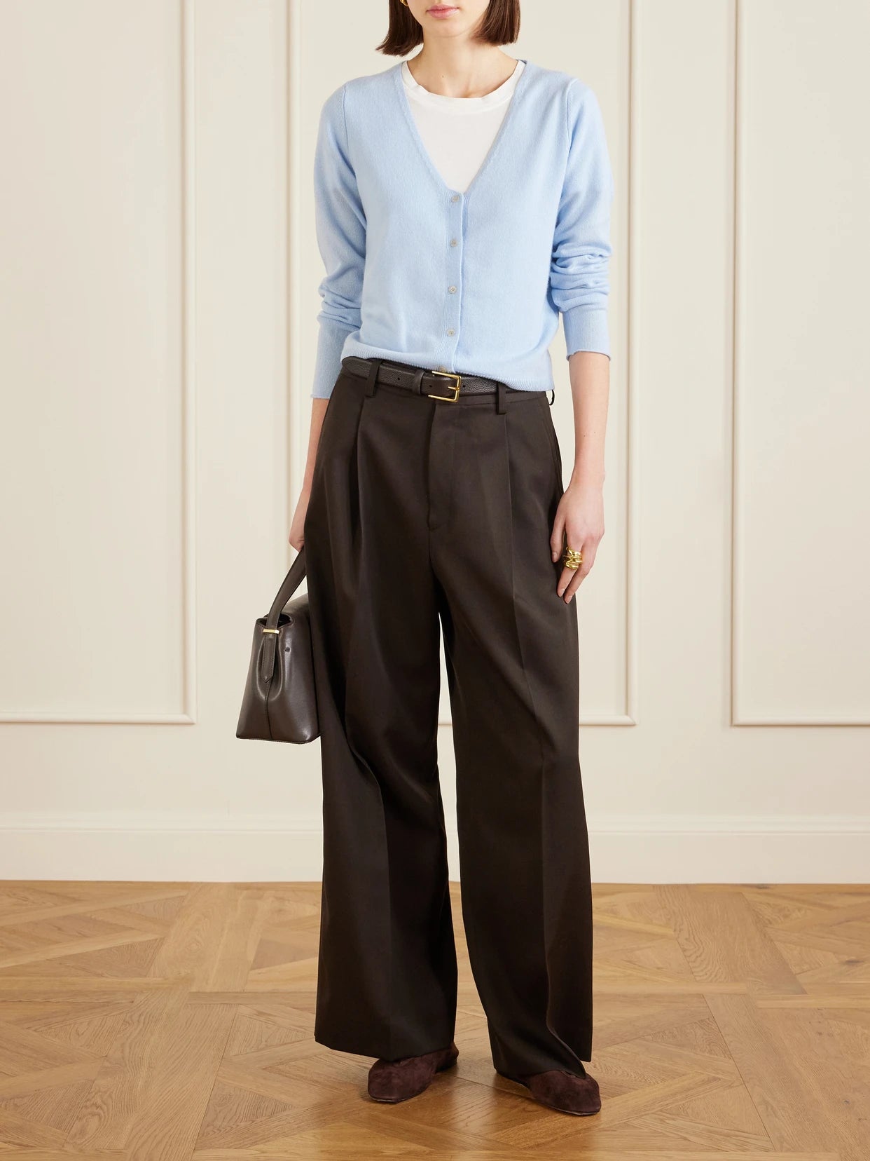 Image of a model wearing Outerwear. Product name - Cashmere Cardigan in Light blue colour by brand - Allude