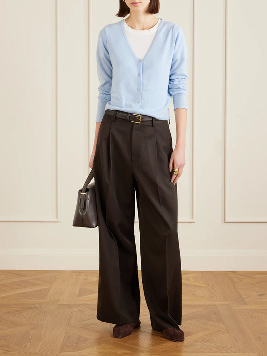 Image of a model wearing Outerwear. Product name - Cashmere Cardigan in Light blue colour by brand - Allude