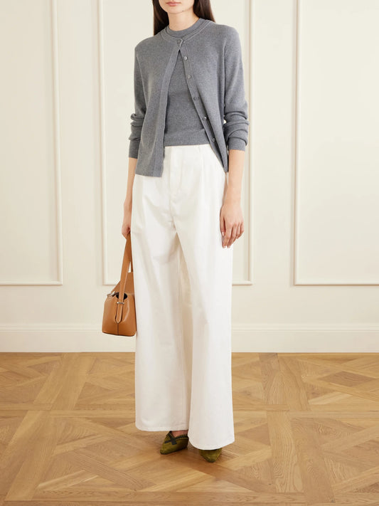 Image of a model wearing Tops. Product name - Amaya Cotton And Cashmere-blend Tank Top in Light gray colour by brand - LISA YANG