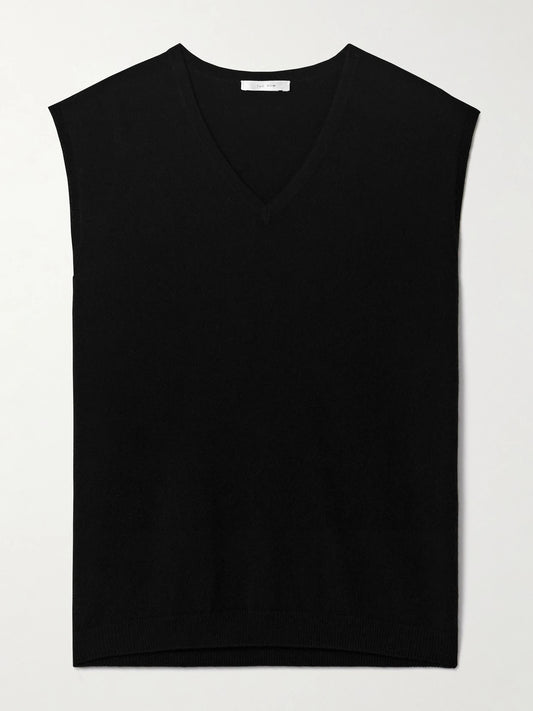Image of a model wearing Outerwear. Product name - Kossy Cashmere Vest in Black colour by brand - The Row