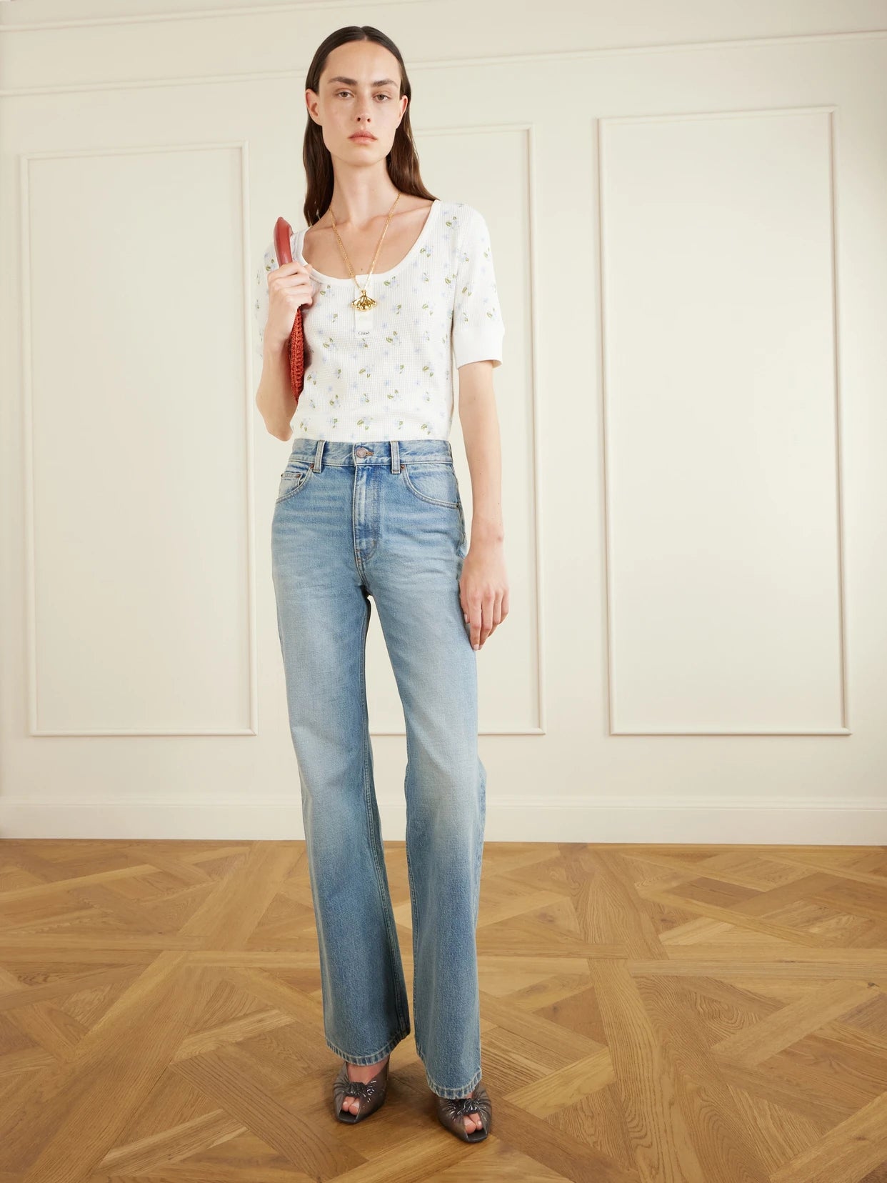 Image of a model wearing Tops. Product name - Floral-print Waffle-knit Cotton-jersey T-shirt in White colour by brand - Chloé