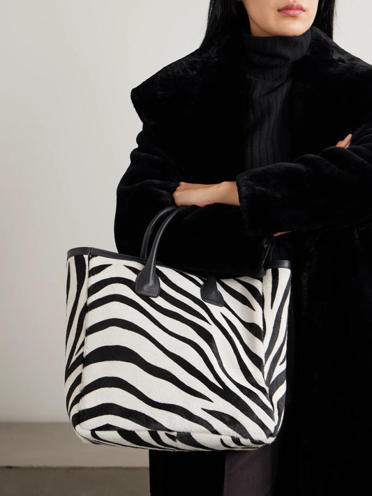 Image of Bags. Product name - Freddie Leather-trimmed Zebra-print Calf Hair Tote in Zebra print colour by brand - Nili Lotan