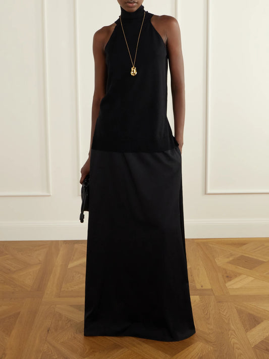 Image of a model wearing Tops. Product name - Devon Virgin Wool Blouse in Black colour by brand - FFORME