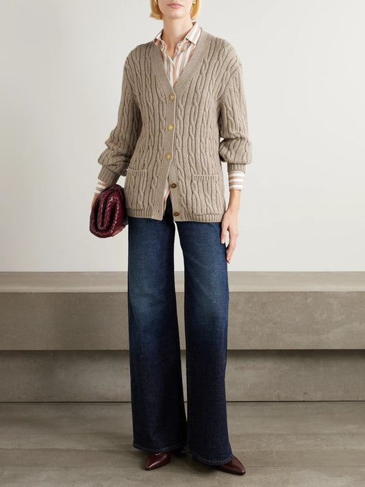 Image of a model wearing Outerwear. Product name - Cable-knit Cashmere-blend Cardigan in Beige colour by brand - Loro Piana