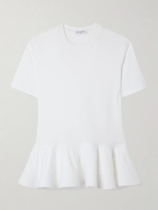 Image of a model wearing Tops. Product name - Oversized Poplin-trimmed Cotton-jersey Peplum T-shirt in White colour by brand - Alaïa