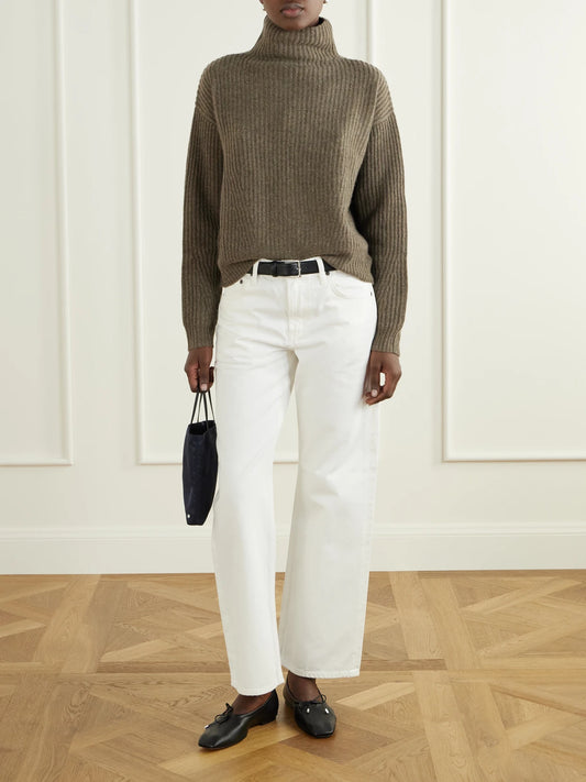 Image of a model wearing Outerwear. Product name - Verbier Ribbed Cashmere Turtleneck Sweater in Green colour by brand - Le Kasha