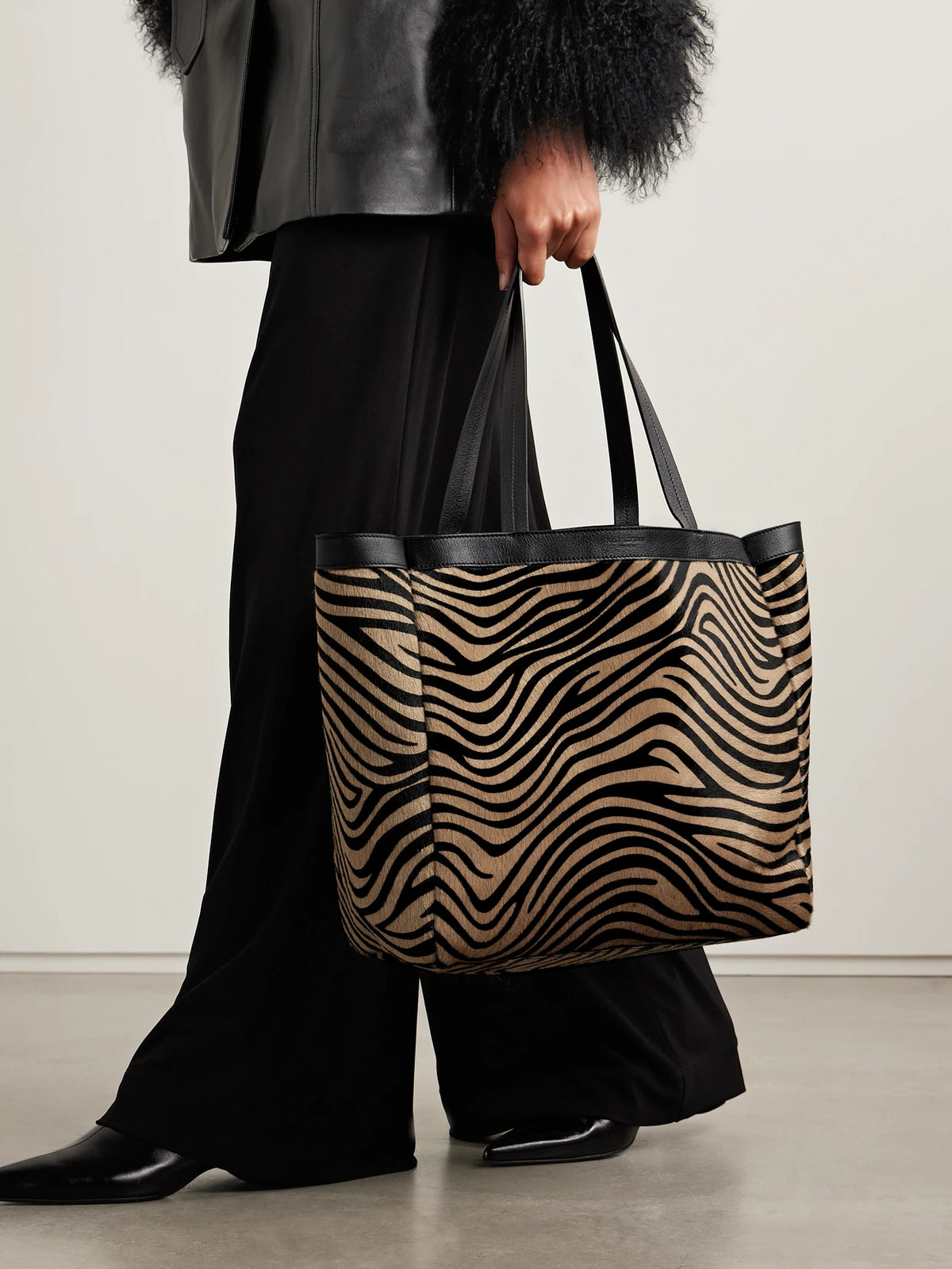 Image of Bags. Product name - Loren Medium Textured-leather Trimmed Zebra-print Calf Hair Tote in Zebra print colour by brand - Nili Lotan