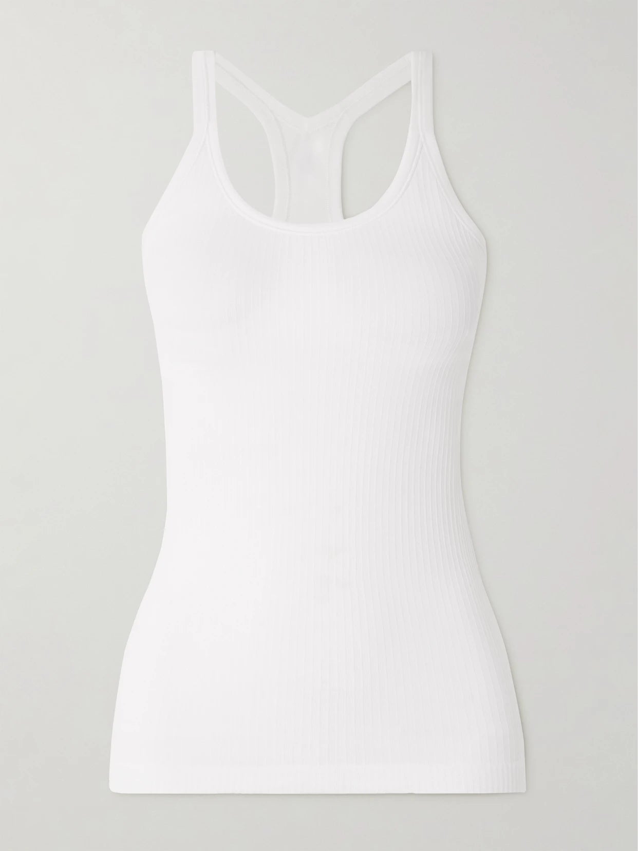 Image of a model wearing Tops. Product name - Yoga Ebb To Street Ribbed Stretch-jersey Tank in White colour by brand - lululemon