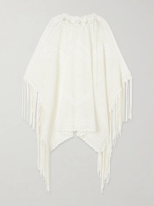 Image of a model wearing Tops. Product name - Metilia Crocheted Fringed Cotton Top in Ecru colour by brand - ISABEL MARANT