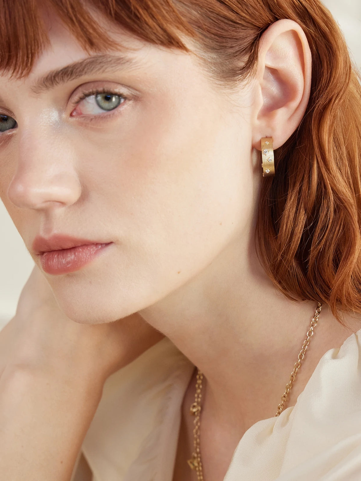 Image of Earrings. Product name - Fluted 14-karat Gold Diamond Medium Hoop Earrings in Multi colour by brand - Sydney Evan