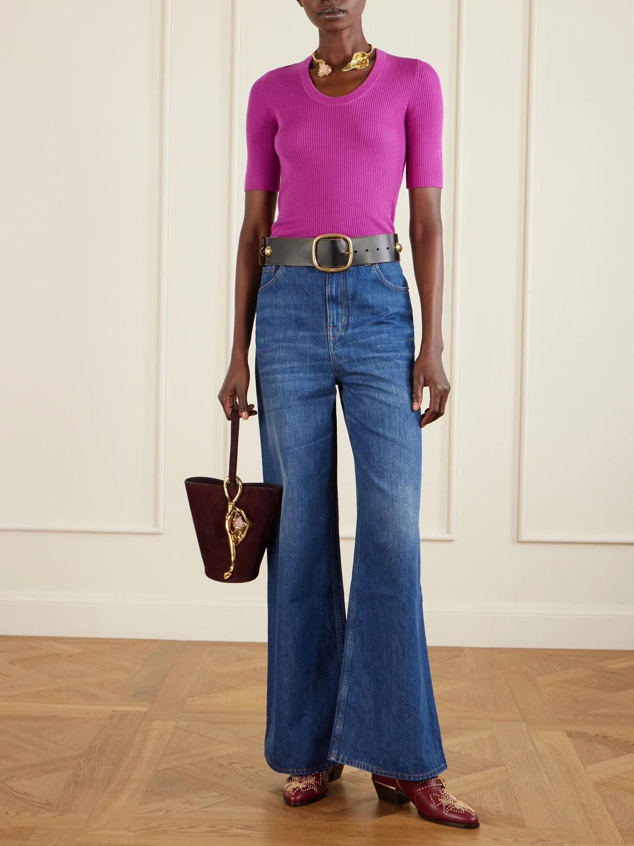 Image of a model wearing Outerwear. Product name - Ribbed Wool Top in Fuchsia colour by brand - Chloé