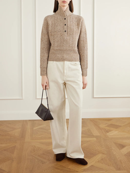 Image of a model wearing Outerwear. Product name - Cropped Wool And Cashmere-blend Turtleneck Sweater in Beige colour by brand - Co