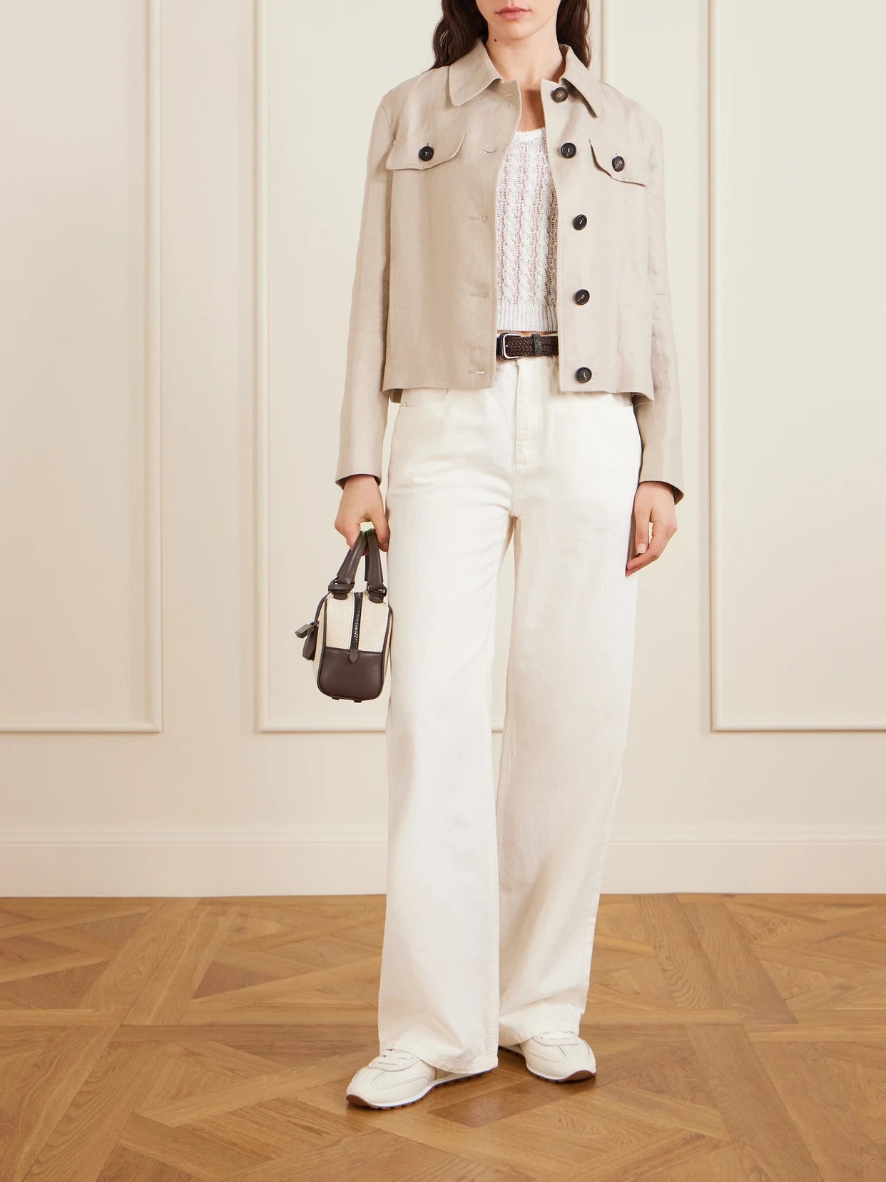 Image of a model wearing Tops. Product name - Sequin-embellished Open-knit Linen-blend Tank in White colour by brand - Brunello Cucinelli