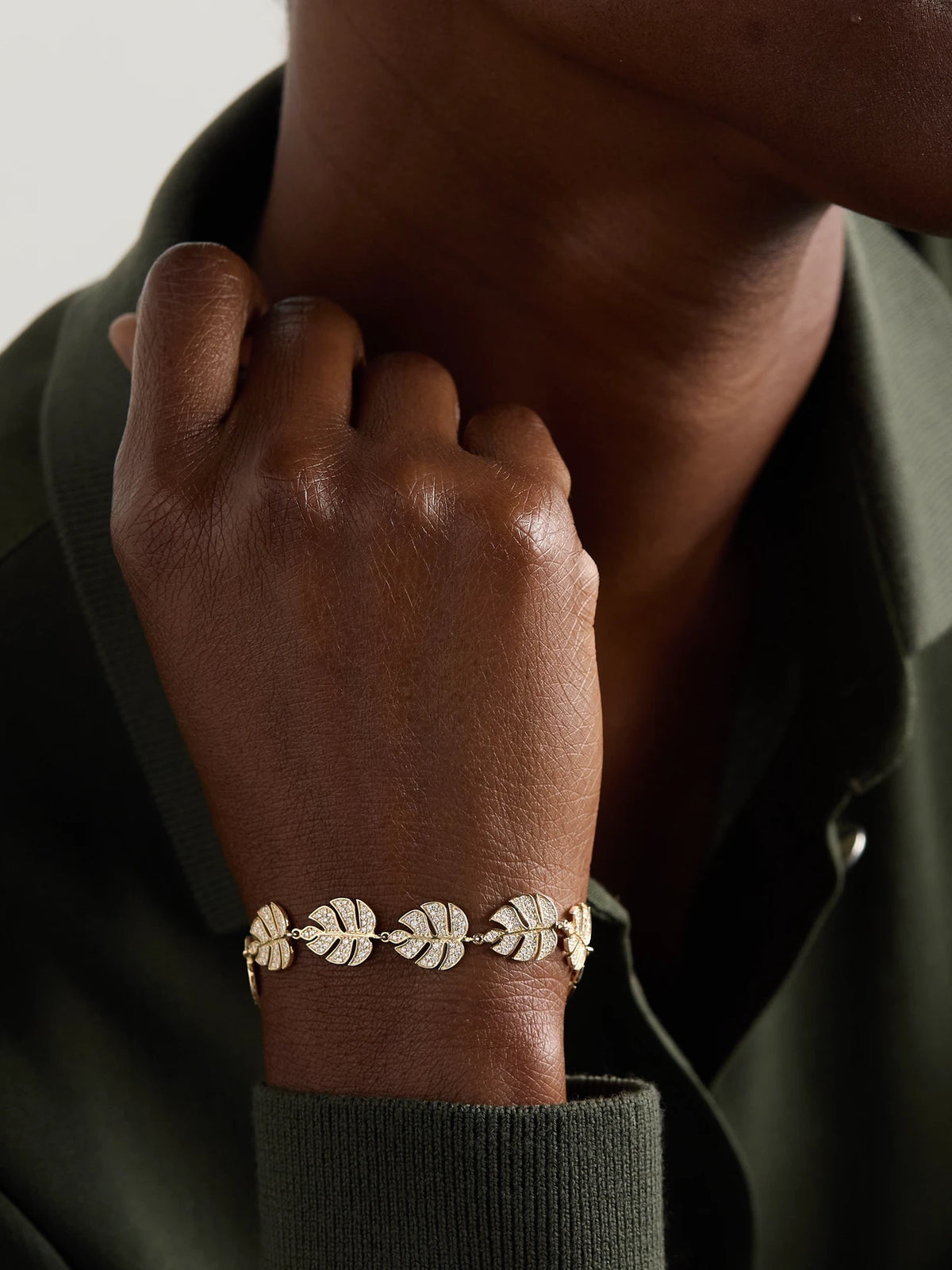 Image of Bracelets. Product name - Monstera Leaf Eternity 14-karat Gold Diamond Bracelet in Multi colour by brand - Sydney Evan