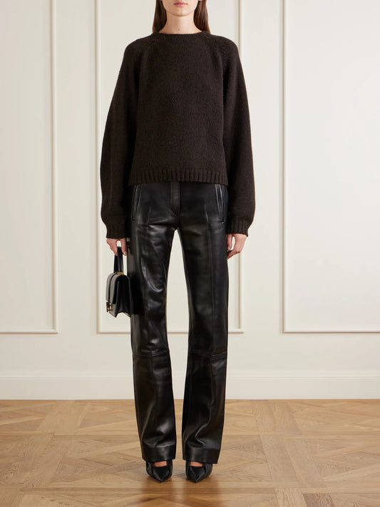 Image of a model wearing Outerwear. Product name - Simone Cashmere Sweater in Dark brown, Light gray colour by brand - KHAITE