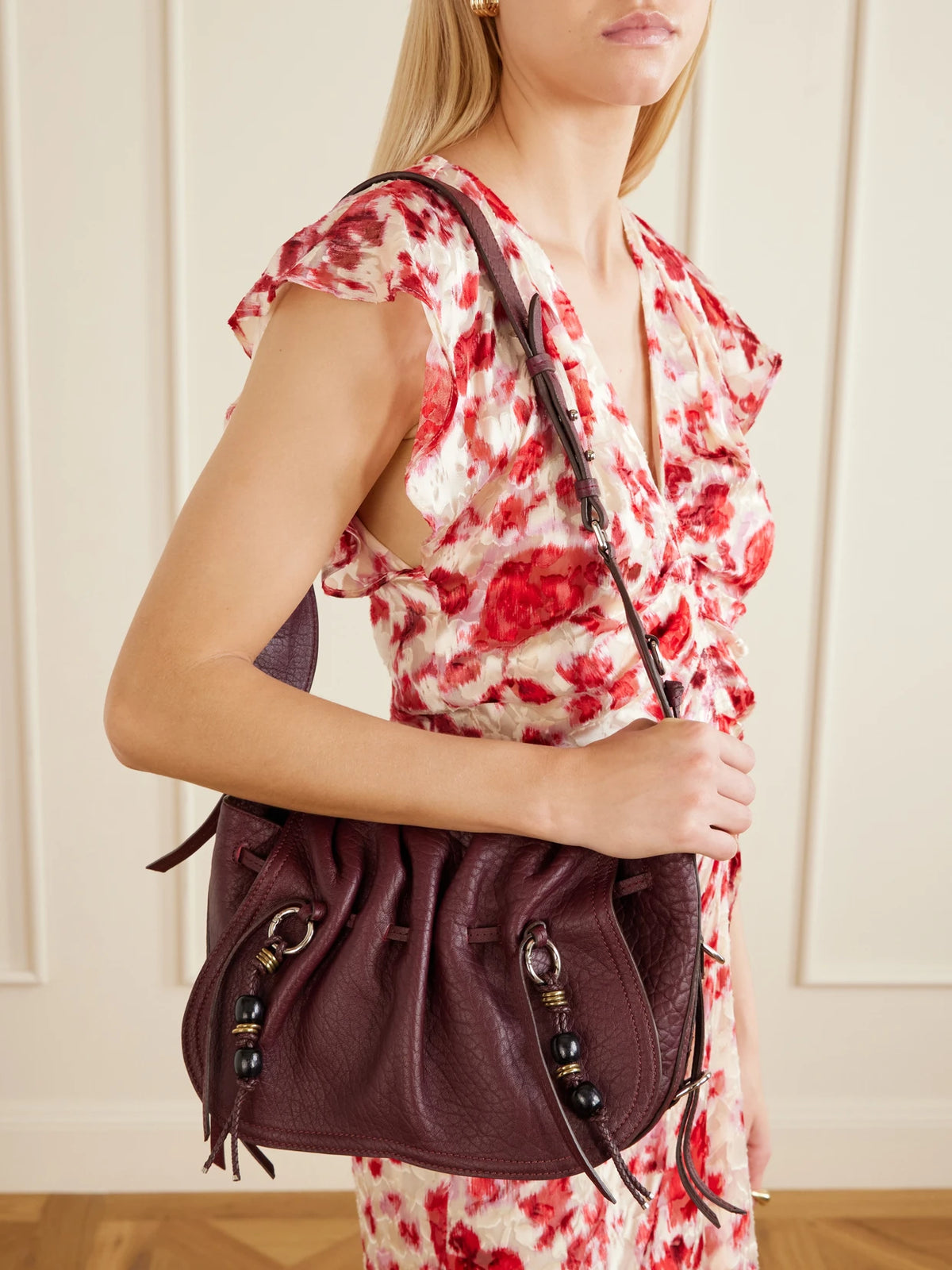 Image of Bags. Product name - Bolton Embellished Tasseled Textured-leather Shoulder Bag in Burgundy colour by brand - ISABEL MARANT