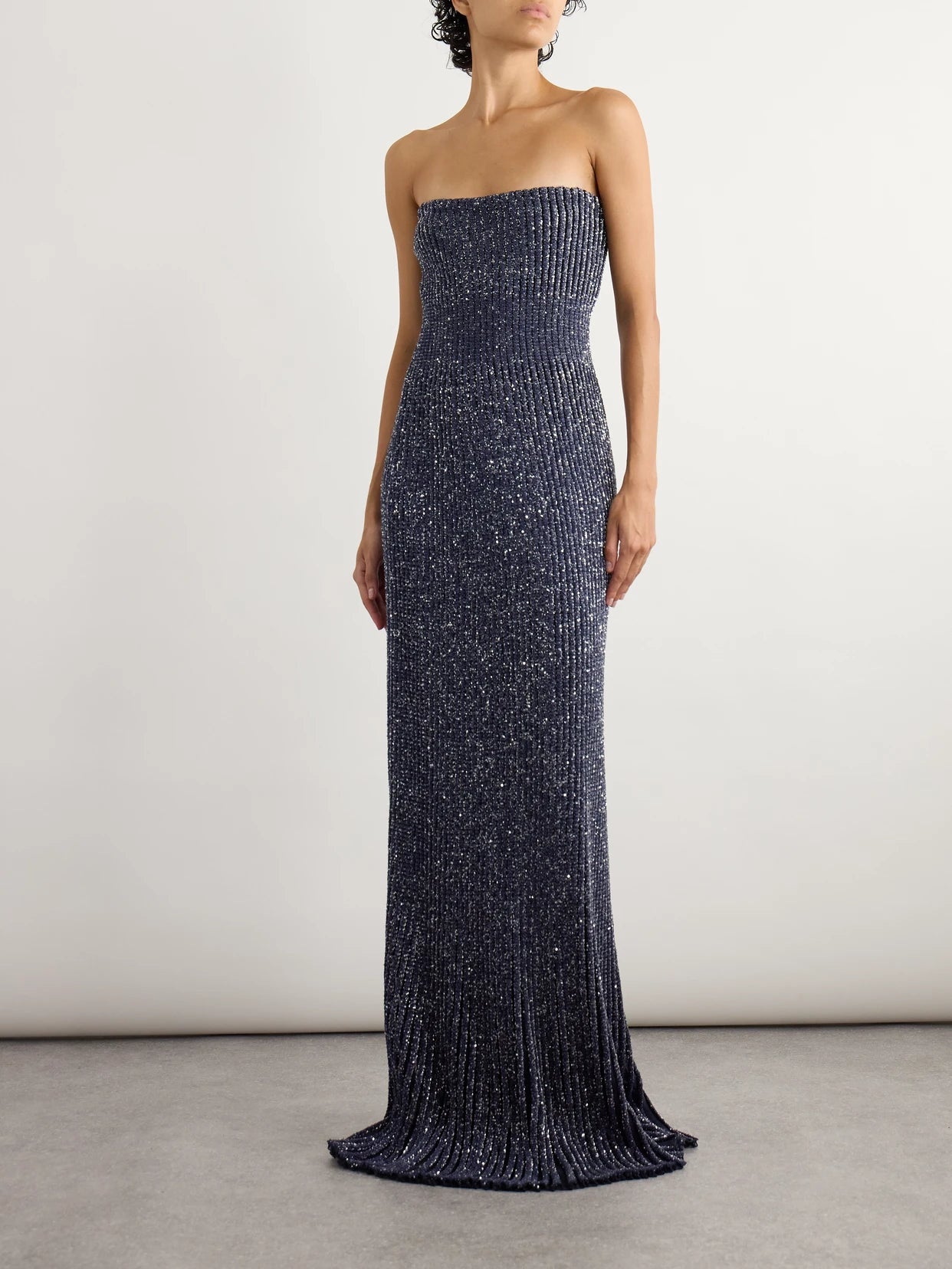 Image of Dresses. Product name - Strapless Sequin-embellished Metallic Ribbed-knit Gown in Navy colour by brand - Alaïa