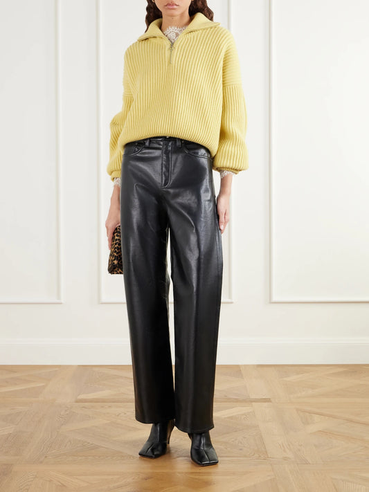 Image of a model wearing Pants. Product name - Verica Leather-blend High-rise Wide-leg Jeans in Black colour by brand - AGOLDE