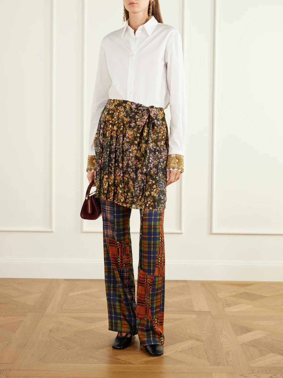 Image of a model wearing Pants. Product name - Skirt-detailed Printed Crepe And Satin Straight-leg Pants in Multi colour by brand - Dries Van Noten