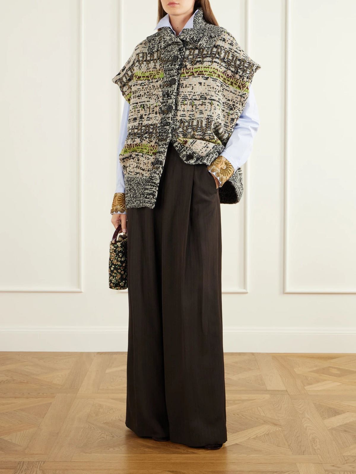 Image of a model wearing Pants. Product name - Pinstriped Crepe Wide-leg Pants in Dark brown colour by brand - Dries Van Noten