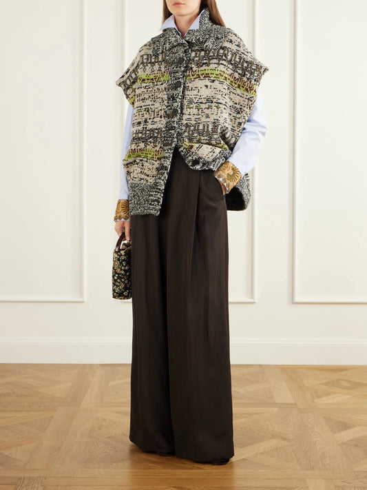 Image of a model wearing Pants. Product name - Pinstriped Crepe Wide-leg Pants in Dark brown colour by brand - Dries Van Noten