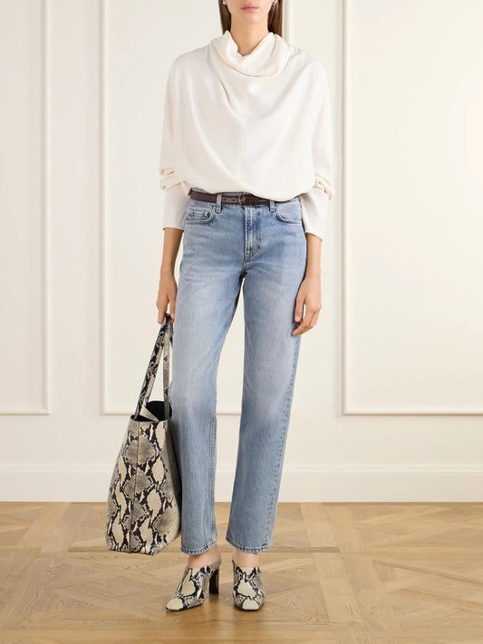 Image of a model wearing Tops. Product name - Draped Cady Blouse in Ecru colour by brand - TOTEME