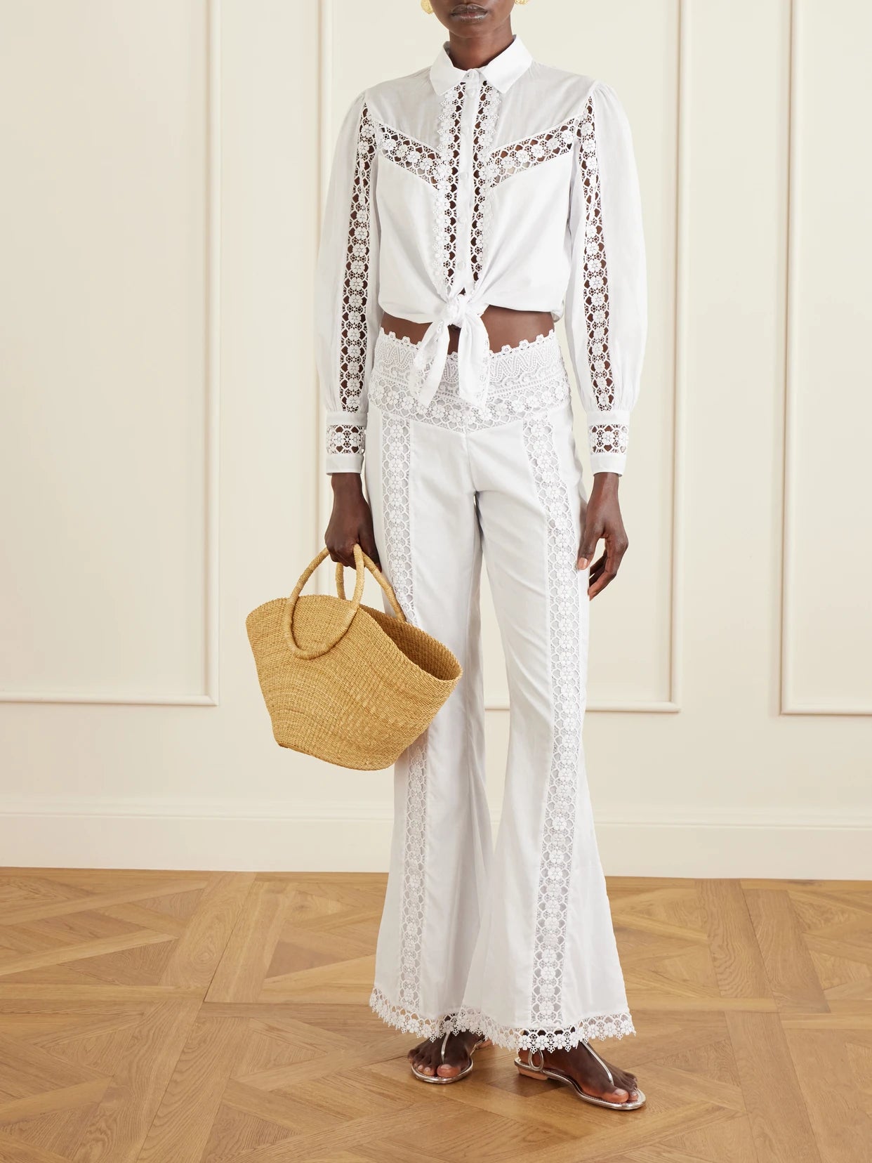 Image of a model wearing Tops. Product name - Devi Cotton-blend Shirt in White colour by brand - Charo Ruiz