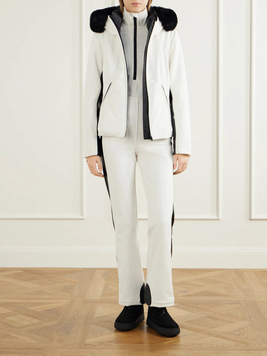 Image of a model wearing Tops. Product name - Keito Stretch-jersey Ski Salopettes in White colour by brand - Goldbergh