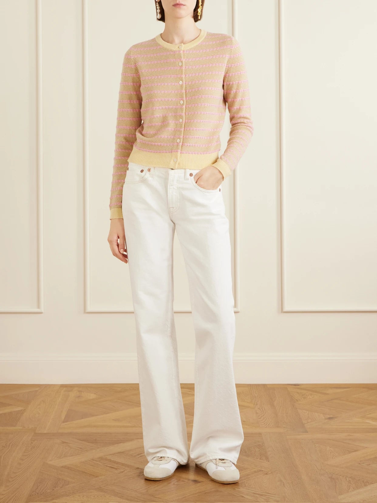 Image of a model wearing Outerwear. Product name - Jane Striped Cashmere Cardigan in Yellow colour by brand - Guest In Residence