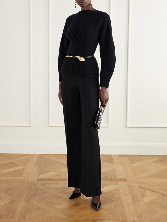 Image of a model wearing Outerwear. Product name - Wool And Cashmere-blend Sweater in Black colour by brand - Carolina Herrera