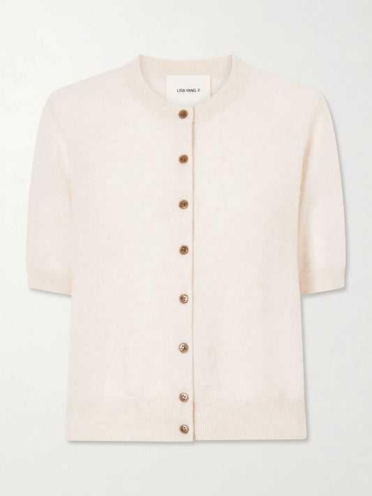 Image of a model wearing Outerwear. Product name - Marene Cashmere Knit Cardigan in Cream colour by brand - LISA YANG