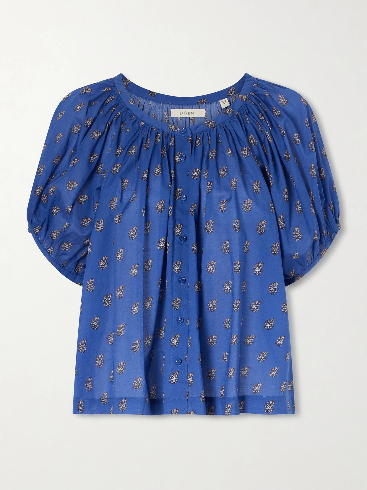 Image of a model wearing Tops. Product name - June Floral-printed Cotton Top in Blue colour by brand - DÔEN