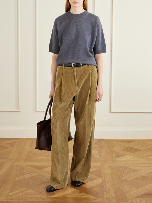 Image of a model wearing Outerwear. Product name - Merino Wool Sweater in Dark gray colour by brand - RÓHE