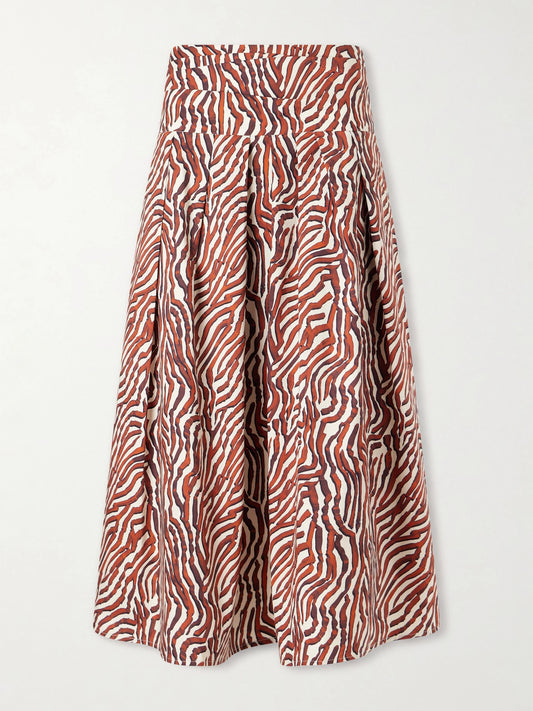 Image of a model wearing Skirts. Product name - Nessa Pleated Printed Cotton-blend Poplin Maxi Skirt in Red colour by brand - Proenza Schouler White Label