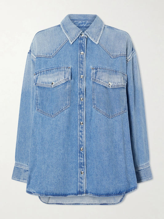 Image of a model wearing Tops. Product name - Lotta Denim Shirt in Mid denim colour by brand - AGOLDE