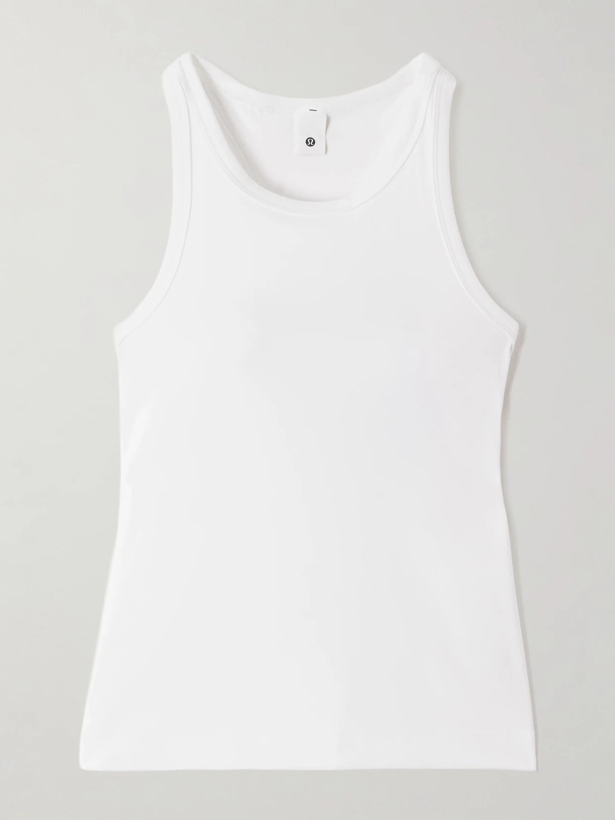 Image of a model wearing Tops. Product name - Align Waist-length Racerback Nulu Tank in White colour by brand - lululemon