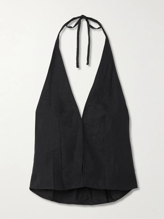 Image of a model wearing Tops. Product name - Linen Halterneck Top in Black colour by brand - Deiji Studios