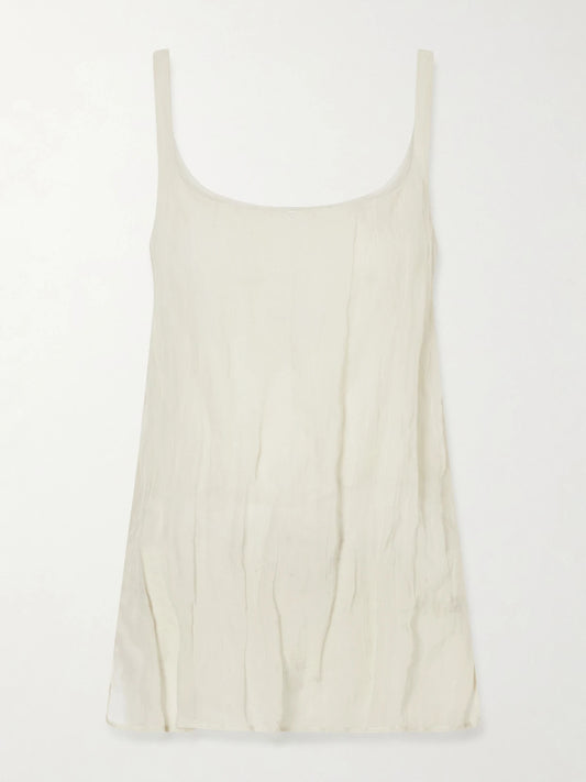 Image of a model wearing Tops. Product name - Cotton-blend Tank Top in Cream colour by brand - RÓHE