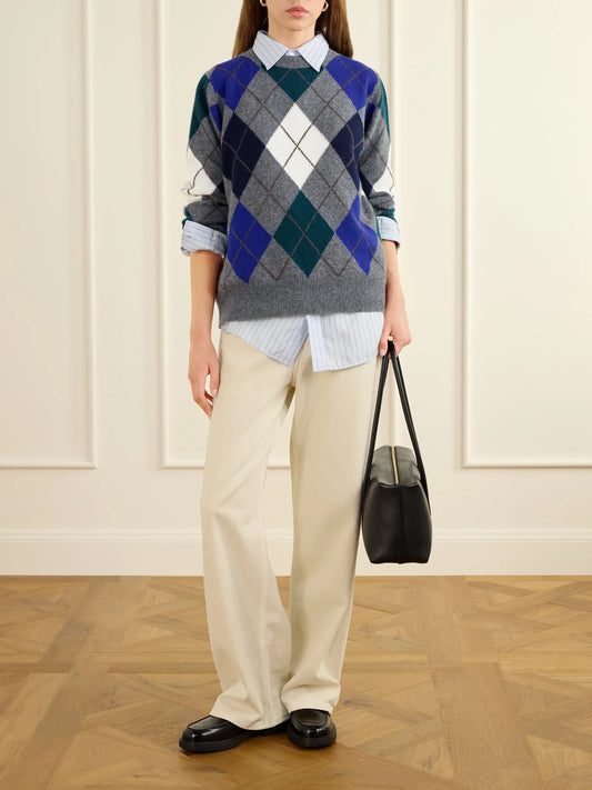 Image of a model wearing Outerwear. Product name - Ava Argyle Wool Sweater in Multi, Gray colour by brand - &Daughter